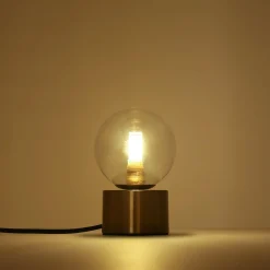 Lámpara de mesa con esfera de cristal