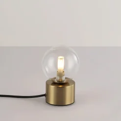 Lámpara de mesa con esfera de cristal