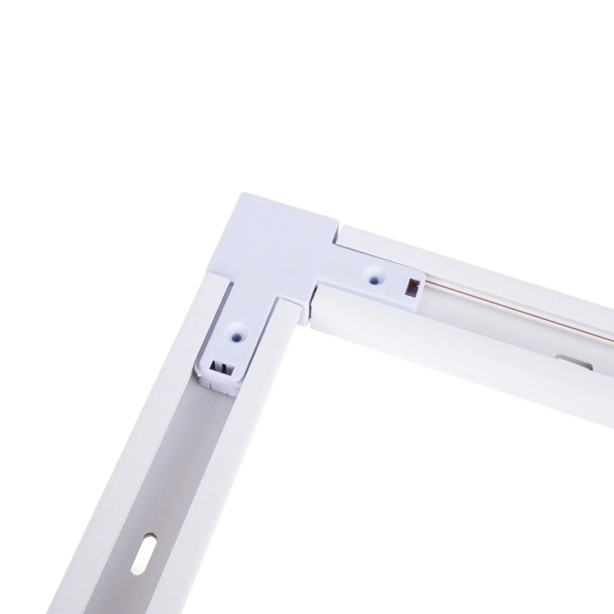 Unión rígida a 90º para carril monofásico de PVC ( Ref.: BTMP)
